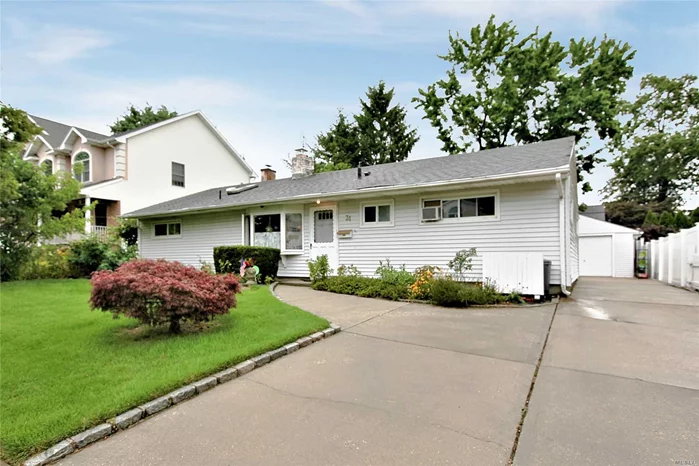 Mid block Ranch with Fenced yard. Separate One car garage with storage can easily be made into 2 Car garage, All Hard Wood Floors/Tile. Wood Cabinet in Kitchen, HE Washer/Dryer.