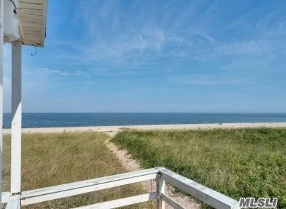 Best deep(100&rsquo; from deck to high water mark) and level sandy beach on the North Fork awaits your presence. Situated on the beautiful North Fork, your pristine setting and spectacular sunsets includes a seasonal 1578 sqft beach cottage with 7 rooms, 2 baths plus a 2nd floor loft and water view covered deck.