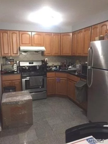 Bright and spacious living room, dining area, kitchen with stainless steal appliances, bedroom, bathroom, washer/dryer in unit and huge terrace. Rental is on second floor. No elevator. Refinished hardwood floors, freshly painted. No pets. Heat and electric not included. Street parking. Two blocks to LIRR.