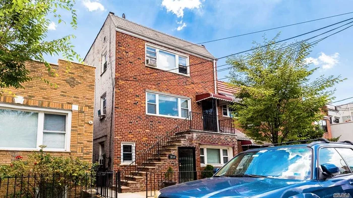 Investors Delight! One Of A Kind Multi Family Brick Home In The Heart Of Astoria.
