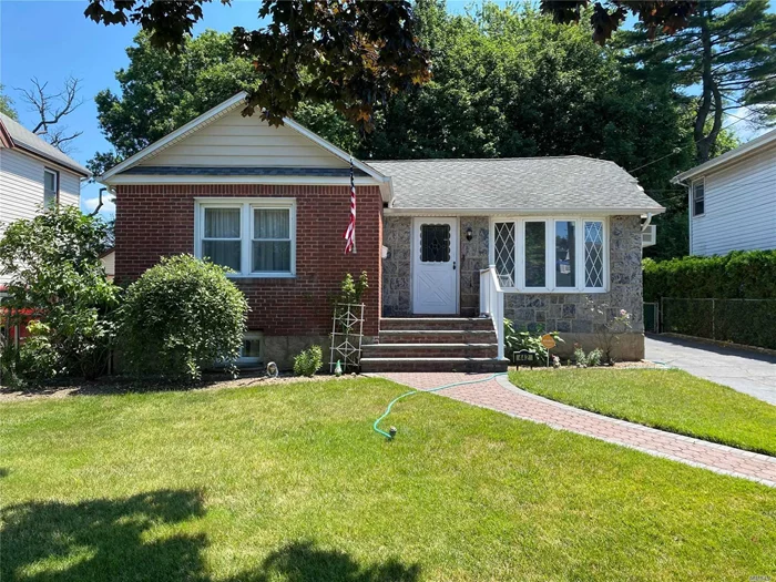 Great location, quiet street, huge garage and screened in porch, gas stove, gas heat, gas hot water heater, full house generator, large finished basement