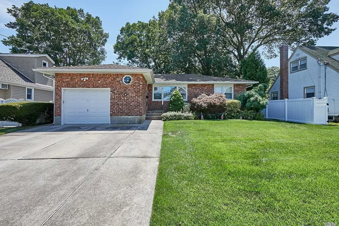 Well Maintained Brick & Vinyl Ranch. Enter to Gleaming Hardwood Floors and Crown Moldings. Living Room, Formal Dining Room, Updated Kitchen, 3 Bedrooms and Updated Hall Bathroom. Full Finished Basement with Electric Heat, Laundry & Utility Rooms. Central A/C, IGS, 1 Car Attached Garage, Double Driveway. Close to Parkways, Stores & Park. Taxes With Basic Star $11, 094