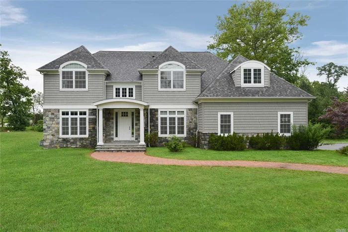 Magnificent Hampton Style. Stone Colonial. 6Brs. 4.5Bths On 1.48 Flat Acres. Sprawling Entertaining Formal Room. Gourmet Kit /Top Of The Line Appliances. This Home Exemplifies Quality, Architecture & Design.