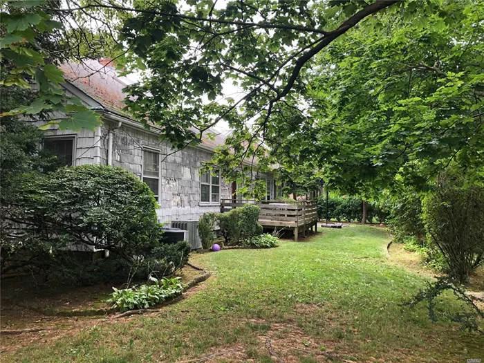 6BR Expanded Ranch on 100x100 Corner Property located in the Heart of Lawrence, Close to All. Lg LR w/Fplc, Lg Formal DR, Den, EIK, Master BR Suite w/Private Bath on 1st Floor with Full Hallway, plus 2 More Bedrooms. Upstairs 3BR, 1 Full Bath, Study + Open Sitting Area with Skylight. Lg Unfinished Basement, this Home offers endless possibilities!