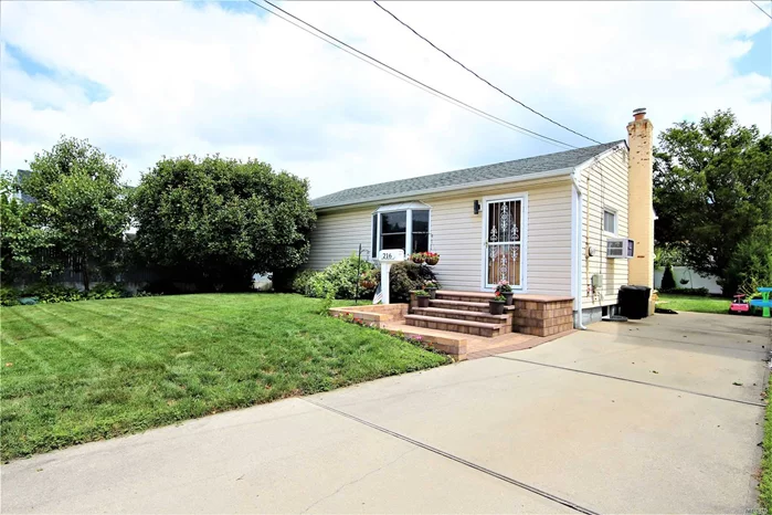 Tastefully renovated and well taken care house. Gas Heat and Gas cooking , 5 years old energy efficient Gas Furnace. Drinking Water Filtration system installed. Split AC unit on main level and basement. Full finished walk out basement . Super low taxes , approx. less than a mile to L.I.R.R. train station and shopping . Mid block location. Well kept lush green huge backyard for entertaining with in ground sprinkler system . Huge lot size 5000 sqft. Priced right for quick sale.