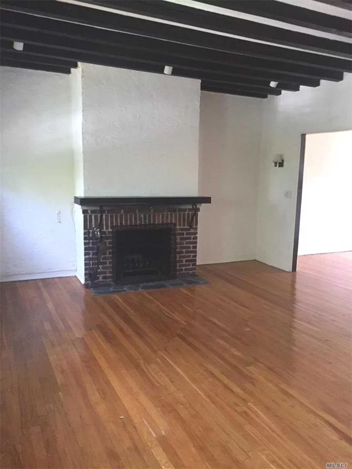 Newly renovated duplex with fireplace. Living Room, Formal Dining Room, Kitchen, 2 bedrooms and bathroom. Hardwood floors. Kitchen with dishwasher. Street Parking. No Pets. Heat and water is paid by landlord. Tenant pays cooking gas and electric.