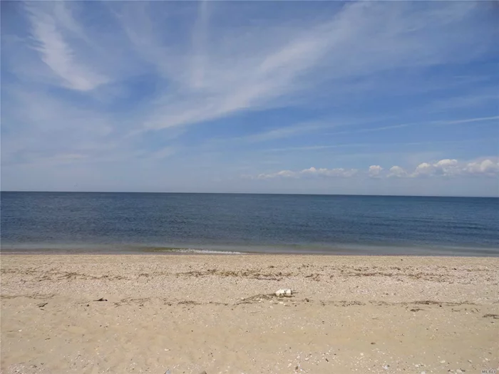 Fabulous Waterfront Lot on Long Island Sound. No Bluff! 200 ft. of Beachfront! Survey Indicates the Lot Size is 1.2 Acres or 52, 600 sq. ft. SCWA water main in street. Lots sold as is - no provisions will be made for subject to conditions for permits, etc.