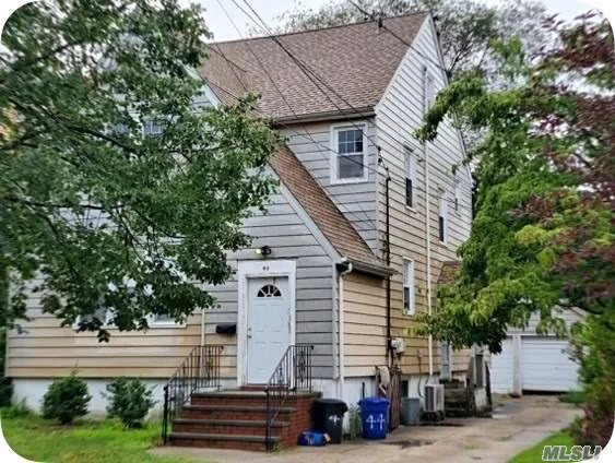 Great Victorian, 5 blocks to LIRR, Shopping Center. Legal 2 Family, great for an investor Featuring 4 Bedrooms, 2 Full Baths, Eat-in Kitchen, Full Unfinished Basement, 2 Car Detached Garage.