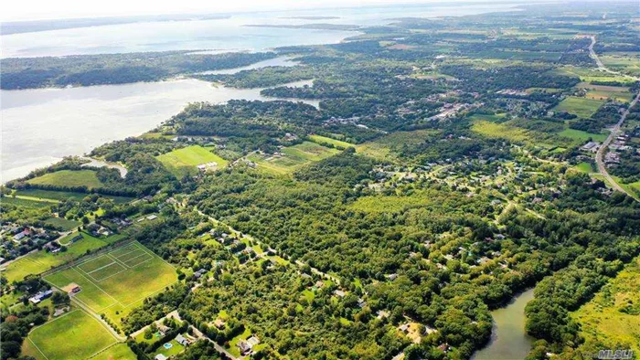 Calling all builders & Investors! Southold, North Fork RARE 50 acre (approx) offering includes 3 lots (705, 751, and 2425 Laurel Avenue) made up of 3 SCTM parcels: 1000-55-6-35 (23 acres) & 36 (11.5 acres) and 1000-56-1-1(10.68 acres). Wooded, sub-dividable LAND with development rights in place - Expired 18 lot subdivision Bayberry can be re-activated per Town of Southold Planning Dept. an ideal investment for builders OR establish your North Fork legacy here: farm, compound, you name it! R80 residential zoning. Close to village amenities, boating and area beaches and more! INQUIRE.