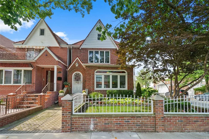 Enter into this fabulous corner property brick tudor home (Legal 2 family being used as a 1). The 1st fl features a chic kitchen & is outfitted w/ mod appliances & granite counters. In addition there is a door from the kitchen leading to the private yard w/ all brick pavers. The spacious livingroom & elegant FDR is perfect for family get-togethers! Upstairs on the 2nd fl there are 3 bdrms (1 is being used as a walk in closet!) and 1 full bath. The 4th level (attic) has 2 bdrms and a storage room. The full finished basement is ideal for a family room and extra storage and the priate driveway and XL 2 car detached garage means never search for parking! Close to transportation and shopping! https://www.dos.ny.gov/licensing/docs/FairHousingNotice_new.pdf