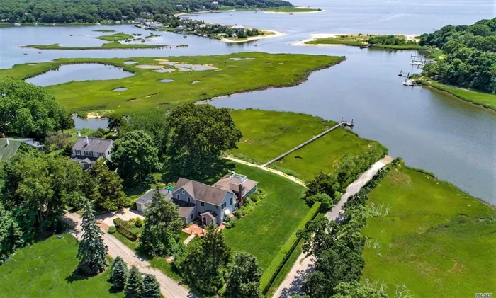 You will fall madly in love when you see this classic North Fork home. Wake up to glorious sunrises - bursts of soft pink and baby blue sun rays; end your day with flaming sunsets! You&rsquo;ll want to pinch yourself just to be sure it&rsquo;s real! Expansive waterviews that extend across the bay to the Hamptons. A deep water dock (2.5 -3 ft MLT) for boating, fishing, swimming, kayaking or paddle boarding. Private, park-like grounds with a lush lawn for kids to run and play. Perennial gardens that bloom all season long. House was renovated and expanded. Living room with large stone fireplace, spacious, enclosed sunporch for dining and lounging while enjoying panoramic waterviews. 4 bedrooms and 3 full baths - a mastersuite on both levels - and a fun loft for kids to play. Plenty of room for pool and tennis court. Hurry, don&rsquo;t miss out on this extraordinary property that will make you forget about time and the outside world!