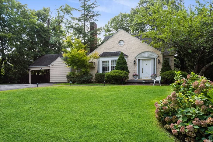 Charming expanded Cape in the Norgate section of East Hills. This home features updated designer EIK w/ sub zero fridge, granite countertops with custom cabinets, granite floors and double skylight lights. Large Family room w/fireplace flows off the kitchen with french doors that open up to a large backyard with a brick patio.Large master suite with a bath on the main level offers privacy. Has a Formal living room with f/p and Formal dining room . Second floor has two bedrooms with an updated bath. Partial finished basement with laundry and play area with a separate large utility room. Updated to gas heat and hot water heater. This home has many extras. A must see. East Hills Park.