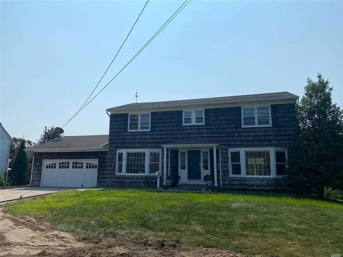 Beautiful Colonial located in cozy & quiet area of Bay Shore near the water! 5 spacious bedrooms including Master Suite w/ WIC. Stunning hardwood floors & kitchen cabinetry. Lots of windows allow for beautiful natural lighting. Plenty of space to relax!