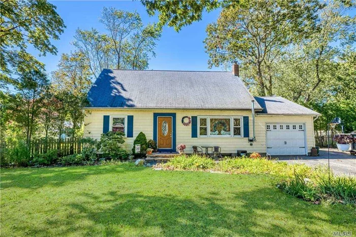 Great House South of Montauk Highway on Beautiful Tree Lined Street in the Heart of Center Moriches Features: Hardwood Floors Through out, Master Bedroom with walk in closet, 3 Additional Large bedrooms, Full basement, 1.5 car garage, large yard, great location close to all!