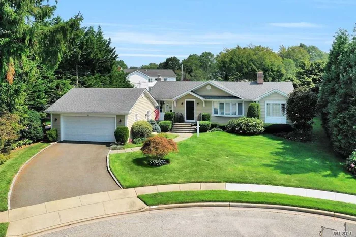 Welcome to this Piece of Paradise in North Syosset&rsquo;s Flower Section. This expanded Ranch features Hardy Board Siding and is perfectly tucked into a private cul de sac location. Custom crafted moldings throughout add a dash of elegance to this pristinely kept and welcoming residence. Oversized deck and brick patios provide a perfect oasis for outdoor gatherings. Lower level den with fireplace and party bar make for spacious indoor entertaining. Low taxes .Berry Hill Elementary.