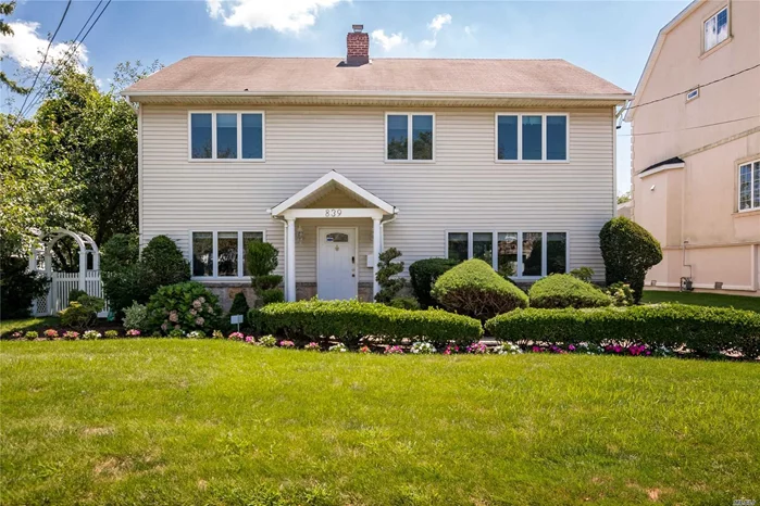 An Updated 4 BR 2.5 Bath Colonial in the heart of of Woodmere School District 15, EIK w/ Modern SS Appl, New oven , Huge Closets in every rm, CAC 2 zones, Gas Heating 2 Zones W/ Indirect Tank, In Mbr 2 custom walk-in closets, 7 year old boiler, Air handling system 3 years old, WIFI Thermostats, Dental crown moldings, Recessed lighting, Hardwood Fls, Optional sconce settings, Most appl are under warrantee, 2 motion censors, smoke alarms in every Br, Custom French Doors, Large yard, Close to Lirr.