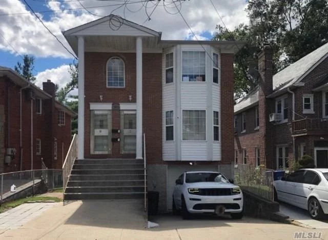 Nice Neighborhood, Luxury 2 Family House With Spacious Layout, Newly Renovated And Well Maintained. 3 Br and 2 Bath On Each Floor, Full Finished Basement With Family Room, Summer Kitchen, Office and Full Bath, OSE. Private Driveway With Attached Garage. Close To Northern Blvd And The LIRR. P. S. 94 & J. H. S. 67.