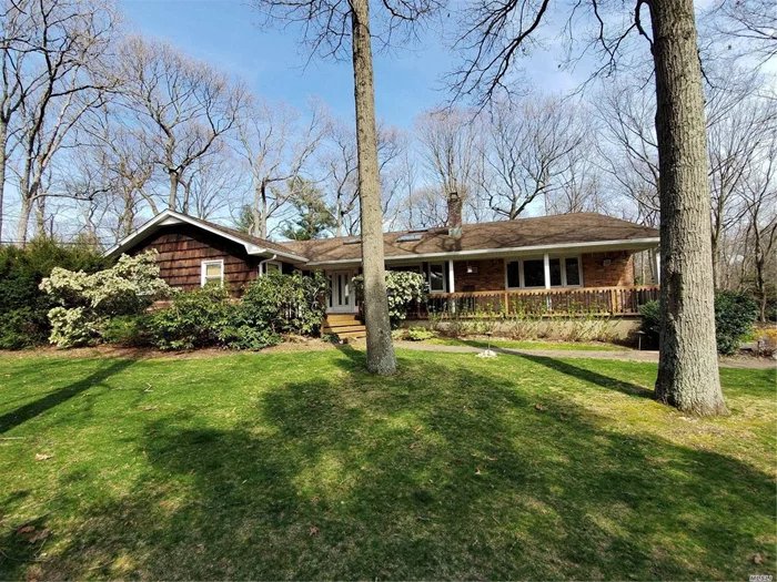 This Sprawling Ranch Situated on 1.09 Acres In North Syosset Features 5 Bedrooms and 3.5 Baths. Eat In Kitchen With 2 - 4ft Skylights, Formal Dining Room, Formal Living Room, Family Room with Dual Fireplace. Master Suite has 2 Walk In Closets, & Master Bath Has Steam Glass Enclosed Shower. Enjoy This Private and Secluded Home With Room For A Pool and Tennis Court, Full House Security System with Hard Wired Fire and Carbon. Water Purification Installed. Entry Has 4ft Skylight and features a 2.5 car attached Garage and Room to Park 7 Cars in the Driveway! Enjoy the Privacy on the Desirable Cherry Lane!