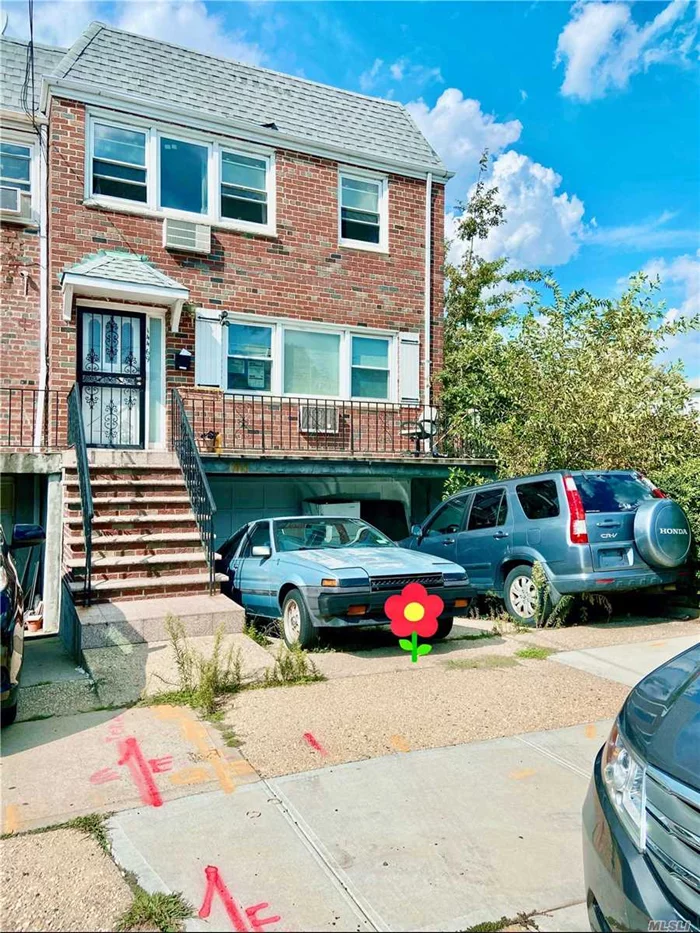 Location!Location! Welcome to this beautiful and huge 2 family corner townhouse located in the center of Flushing. Lot:31x100, Building 21x50. Side yard 10x100, have plenty space for privacy. Each floor features an apartment with 3 bedrooms and 1.5 baths. Finished basement with front, side and back separate entrance all above ground. Convenient to supermarkets, schools, highway, transportation.