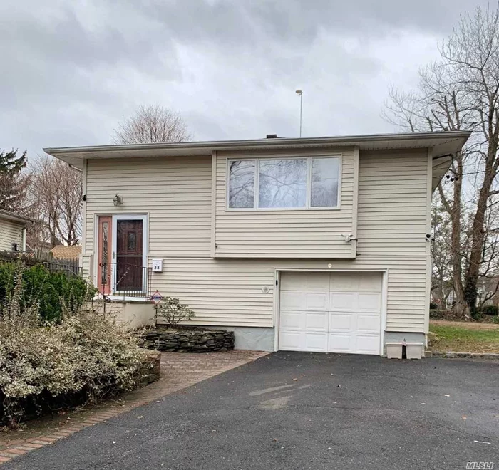 Move in Ready! Updated Hi Ranch! Living Room, Fdr, Eik, 2 Bdrms, Full Bath. Lower Level; Large Family Room, 1 Bdrm, Full Bath & Sliders to Spacious Yard w/Slate Patio. Possible Mother/Daughter with Proper Permits.