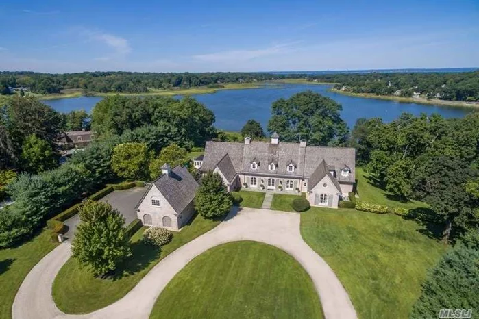 Superbly Crafted 6 Bedroom Stucco Waterfront Estate With Waterviews from Every Room. 512 Ft of Direct Waterfront on 5+ Acres with Mooring Rights For Boating and Swimming.Built in 2004, this House is Wonderful For Gracious Entertaining Inside or Outside While Enjoying the Waterfront Sunsets
