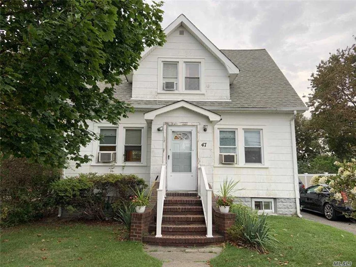 Amazing Opportunity to Own a Unique Legal 2 Family by CO Duplex in the heart of Lindenhurst. This property can be sold with tenancy. Seller was receiving 2300/mo & 1575 = $3900/Mo Rent. Tenant pays electric separately. Home Features Two Separate Electric Meters, Hard Wood Floors, Full Finished Basement, Detached Two Car Garage with High Ceilings, Large Driveway, Over-Sized Property & Much More! Don&rsquo;t Miss Out On This One!