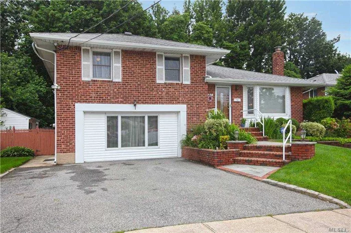 Brick Split Lever House Locate In Middle Black , Behind Robbins Ln Elementary School, Quiet and Convenient .Gas Heating And Cooking, Hardwood Floors Throughout, Second Kitchen On Grand Lever. perfect possible Mother/Daughter Home (need permit) . Award-Winning Syosset School District