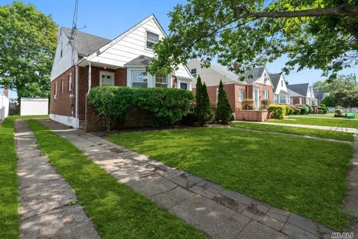 Charming Tudor Cape in The Rath Park Section of Franklin Square. Mid-Block Location, Hardwood Floors, Finished Basement, Approximately 4 Years Young Boiler And Water Heater. Walking Distance to All Parks, Shops, Public Transit, City Buses and Trains.