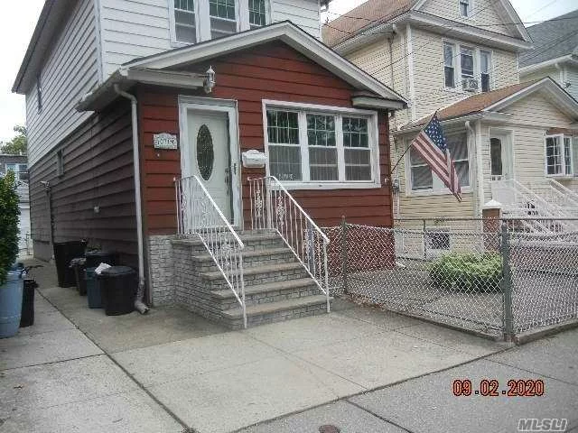 One family - three bedroom, 2 bath detached house with garage, located on a lovely block in Ozone Park,