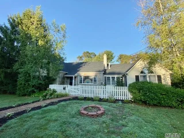 Do not miss this beautifully updated farm ranch in The Pines section of this charming village. Home sits on large landscaped very private property within walking distance to Wohseepee Park, and restaurants. Master Bdrm on first floor w/Full bth! Updated EIK kitchen w/SS apps, new backsplash. Flr w/FP, great rm w/cathedral ceiling, large breakfast nook over looking perfectly landscp bkyrd. Beautiful oak floors, updated windows, partly fin bsmnet w/cool bar and outside access. Large 2 car detached garage, IGS amazing private backyard with large deck. Village amenities inc, parks, beach, docking, gazebos, snow, removal, code enforcement. This is Brightwaters Village lifestyle at its best!