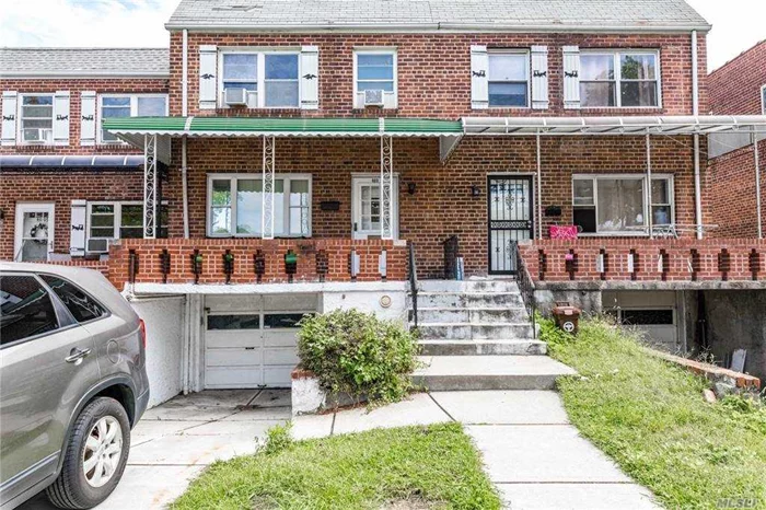 Beautiful solid brick townhouse located in the prime location of Bayside. A block away from Northern Blvd. 3 Bedroom 1.5 Bath, full finished basement with ose, garage, pvt driveway. SD26, Close to Lirr, public transportation, shopping and school.