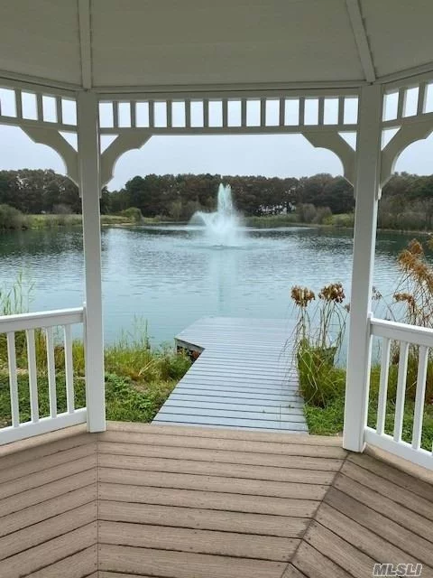 LIVE THE RESORT LIFE! 55+ GORGEOUS COMMUNITY. WALKING DISTANCE TO CLUBHOUSE. ENJOY THE HEATED POOL, WHIRLPOOL, CLUBHOUSE, GREAT ROOM, LIFE FITNESS CENTER. PLAY SOME BOCCE OR PUTTING GOLF, WALK THE TRAILS. RELAX BY THE GAZEBO BY THE LAKE.. WANT TO TAKE A PADDLE OR ROW ON THE LAKE.THERES SO MUCH ENTERTAINMENT! THIS BEAUTIFUL 2 BEDROOM CONDO, 2 FULL BATHS, EAT IN KITCHEN, DINING ROOM, LIVING ROOM, OUT DOOR PATIO IS LOCATED ON THE FIRST FLOOR AND IS JUST A BEAUTIFUL PLACE TO ENJOY!