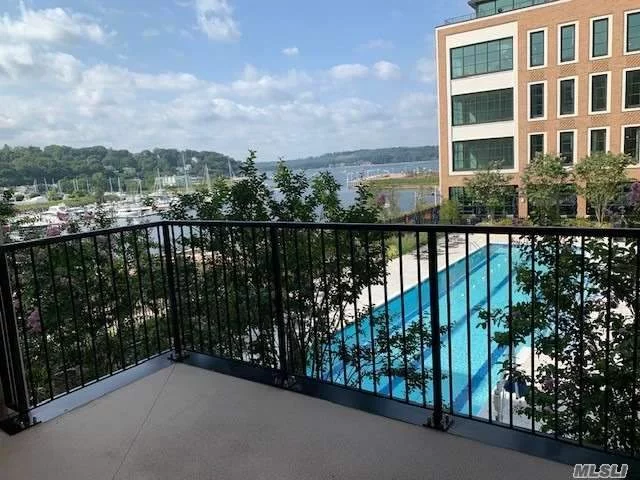 Spectacular Views of the Water and Outdoor Pool from this 3rd floor luxury residence at The Beacon at Garvies Point. Walls of Glass! 10&rsquo; ceilings. MBR ensuite FBth, whirlpool, WI Closet, Reach In & Linen. Add&rsquo;l Bdrm w/ensuite FBth, W/D, GE Monogram appliances. New Community w Resort Style Living in a Doorman & Concierge Bldg by RXR. Saltwater Heated Pool, BBQ, Fitness, Yoga, Lounge, Library Game Rm, Movie Screening Rm, Party Rm Ferry Landing to NYC. Kayaking, Boat Moorings Avail.