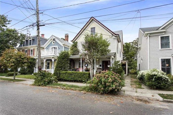 This charming two family sits in the heart of Greenport Village. First floor boasts a large two bedroom apartment with hardwood floors, kitchen and dining room. Second floor is also a two bedroom, with two full bath. There are many original details with great architectural interest. Walk to all.