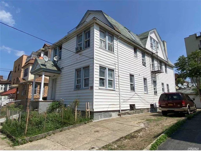 Most Desirable A1 Location in heart of Elmhurst, 2 Blocks to 74 St . Roosevelt Ave. Train Station, #7, E, F, M, R, Train, Bus Terminals to LGA airport, Detached 5 Family House on 40 X 95 Lot Size, 22 X 58 Building Size with 2 Detached car Garage, Additional 3 Parking spots on the Driveway. Perfect for a family & Investors. Great income Producer. House is Sold as is condition with Tenants who pay on time. All month to month, No Leases. It is close to Park, Supermarkets, Restaurants, Delis, Bakery many more !!!