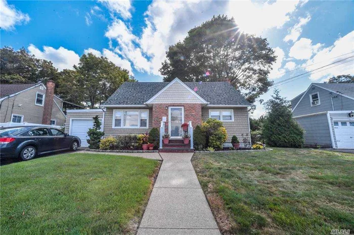 Don&rsquo;t miss this beautiful expanded cape! Great curb appeal with large beautiful backyard .Open floor plan with large rooms. Huge EIK with separate dining room. Updated floors, bathrooms. New CAC and many more updates!!