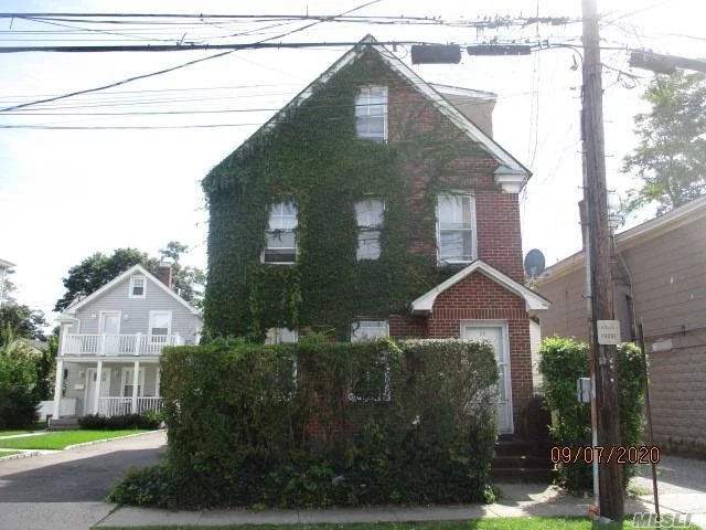 SPACIOUS DETACHED BRICK COLONIAL WITH DETACHED GARAGE AND LARGE YARD. WALKING DISTANCE TO SHOPPING AND TRANSPORTATION