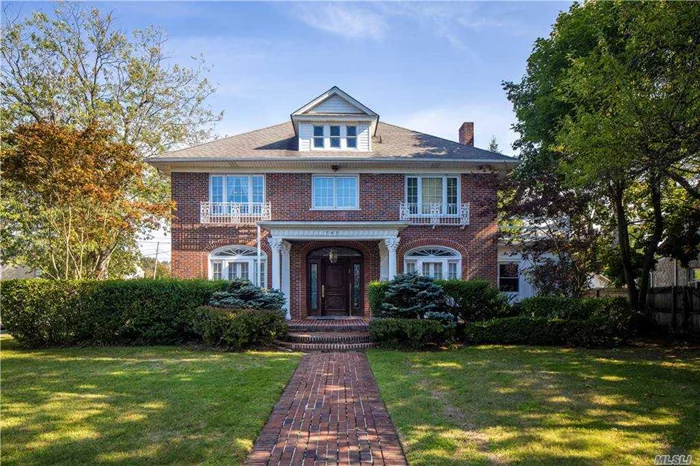 This Stately Brick Center Hall Col with high ceilings and huge rooms will impress you from the moment you catch sight of it&rsquo;s beautiful Coronithian Columns set way back from the street. 6 BR and 3.5 bath, close to 4, 000 sq ft on a large 80 x 160 lot, very low taxes. Crown moldings, 9 foot ceilings T/O home, hdwd flrs, Gas Cook,  marble floor in entryway, huge dining room, walk-up attic and finished basement full size of home, new roof, CAC 2 zones, Walk to all!