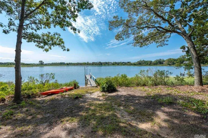 Incredible Creek Front Ranch with Dock and Direct Peconic Bay Access