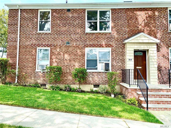 Great starter home UPPER UNIT for first time homebuyer. Why pay rent when you can build equity? Excellent south facing corner unit. Light filled and bright. Large windows.. Wood floors throughout. Attic storage. Laundry facilities on property. Close to buses, LIRR, shopping and restaurants. Needs your personal touch. Many possibilities. No flip tax. Low maintenance. Location is primo!