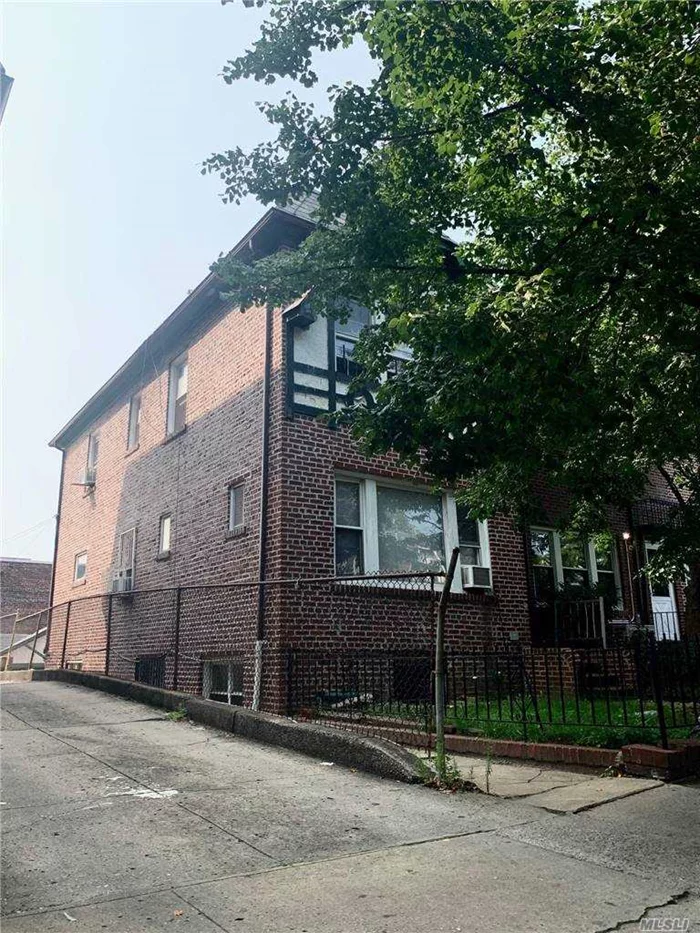 Legal Three Family In An Excellent Location in Jackson Heights, Legalized Walk-In Basement 1bedroom Apt, First Floor 2Bedroom Apt, Second Floor 1Bedroom Apt, A 2 Car Garage, 2 Parking Spaces, Close to Markets, Shops, School and Public Transportation!