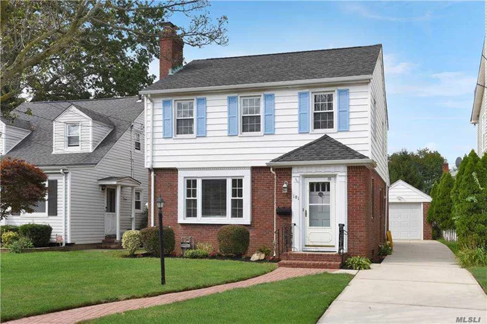 Thoughtfully updated 3 bedrooms and 1.5 baths Colonial located in the heart of Duncan Estates in Hempstead. Close proximity to shopping, trains and Hofstra University. In terrific condition, this beautiful home features a spectacularly remodeled eat-in-kitchen with all new quality cabinets, stainless steel appliances and silestone countertops. Classic crown molding with hardwood oak floors flow throughout the interior. Amenities include central air, natural gas heat and a generator. Every room is perfectly proportioned, including a living room with fireplace, formal dining room and four season den. The backyard is private and contains a patio, full garden and 1-car garage. This fantastic home is move-in ready! Low taxes make this offering a great buy.