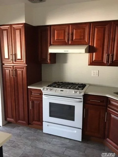 Excellent condition, spacious, very bright 5 room apartment, 3rd Fl of a 3 Dwelling in Middle Village. 2 boxed bedrooms 15 x 10 & 11 x 17, large LR, Formal DR, new kitchen & bath, 4 closets, hardwood floors. Large windows, very bright, neat and clean.Heat & hot water included. Newly Renovated!