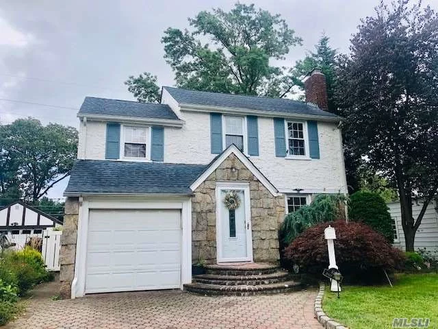 Lovely 3 Bedroom colonial with Central Air, Fireplace, Nice size gated yard. Walking distance to the Park and Westwood RR, Stunning tree lined street. Well maintained with space for all,