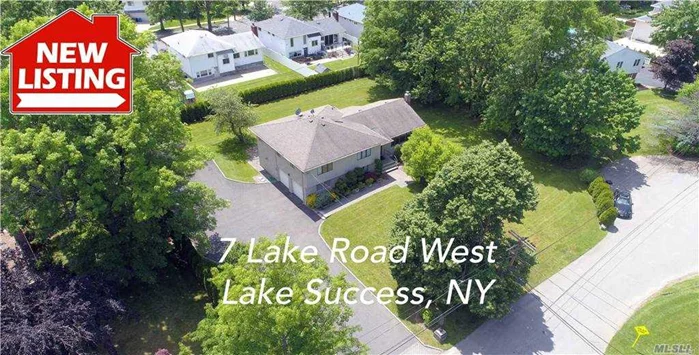 Lake Success Desirable Lake Area. Contemporary Split Level With Dramatic Vaulted Lr, Dr Den With Fireplace Opens To Bluestone Patio. Designer Kitchen And Baths. Radiant Heat Floors Under All Stone Floors. Wonderful Flat Almost 1/2 Acre Flat Property, Sunny East Facing. Enjoy Lake Success Country Club Community With Private Pool, Tennis And Police.