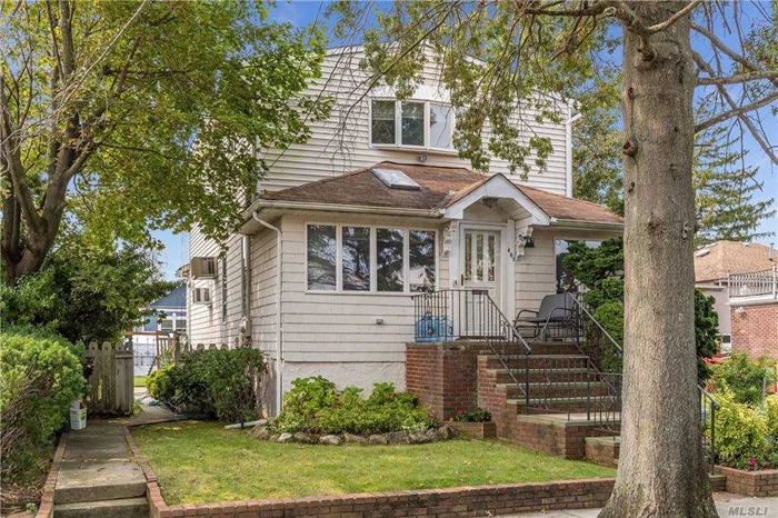 Spacious colonial with 4 bedrooms and 2 baths upstairs, updated kosher eik, separate access to legally rentable basement apartment, deck.