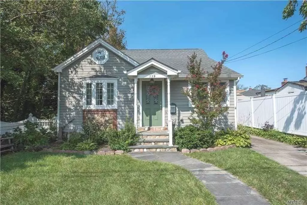 Adorable Gingerbread House in Babylon Beach Estates renovated in 2008. Living room with Gas Fireplace, open kitchen and dining area, oak floors. Everything fairly new. Association docking and beach rights . Includes 40 x 100 property on west side of house.  Located in x zone