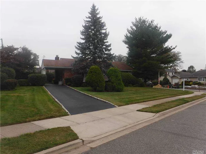 Corner Ranch with 3 bedrms hardwood floors/Fireplace in Livingrm/Carport/ Central AC /Sewers/Gas in home used for cooking/Oil heat and separate hot water heater . Full Finished basement with private entrance. Close to All Major Highways. Syosset School District.