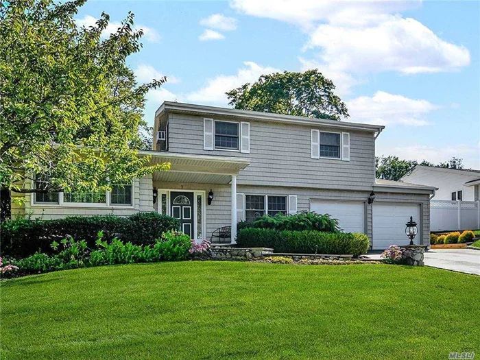 Fabulous colonial with spacious & bright entry foyer leading to 2-year old eat-in-kitchen with new appliances, formal dining room, den w/fireplace, pantry, laundry, mud area. Formal Living room just off entry up a few steps. Master bedroom w/master bath & 5 large closets, 2 additional bedrooms and full hall bath with marble counters and skylight. Whole House Generac Generator with auto transfer switch, Central Air Conditioning, mid block location, in-ground sprinklers, 2 attics with pull-down stairs, low taxes and oversized 2-car garage make this a perfect house!