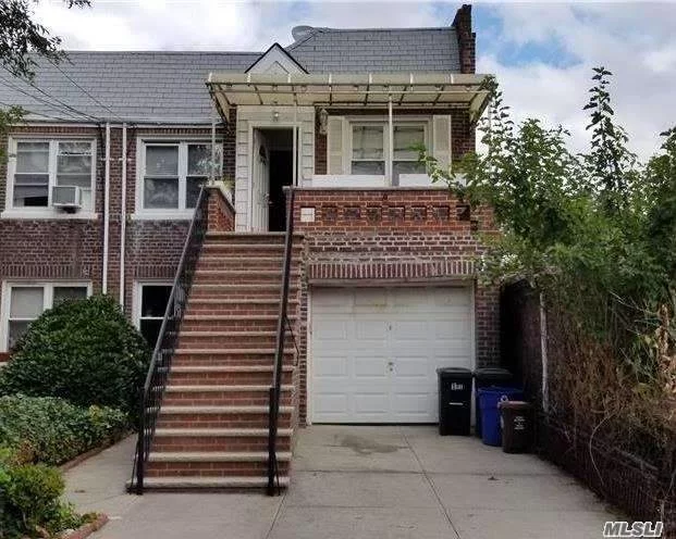 Beautiful Legal 2 Family Semi-Detached House. Move In Condition. 1st Floor Has 1Br. 1Bath. Living Room, Eat In Kitchen And Door To Back Yard. 2nd Floor Has 2Br, 1Bath, Living Room, Eat In Kitchen, Washer and Porch. School District #26. PS159, IS25, Bayside High School. Close To LIRR (Bayside Station). Must See It !!